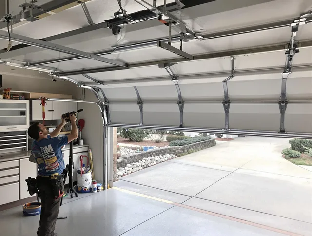 Garage door track repair service by Tega Cay Garage Door Repair in Tega Cay